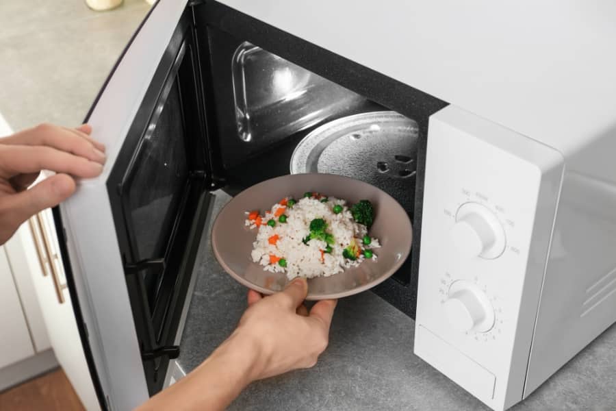 fix undercooked rice on microwave oven