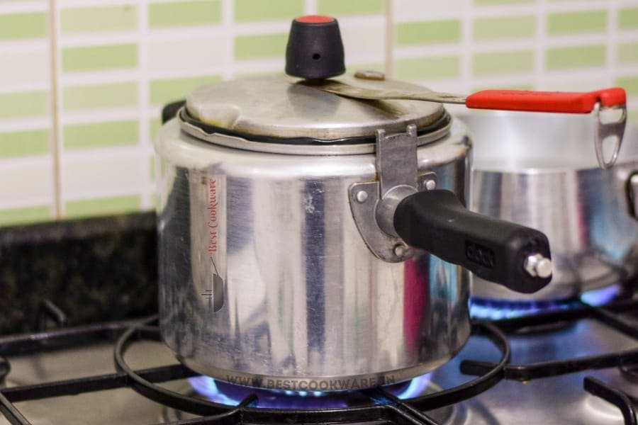 cooking with pressure cooker on gas stove
